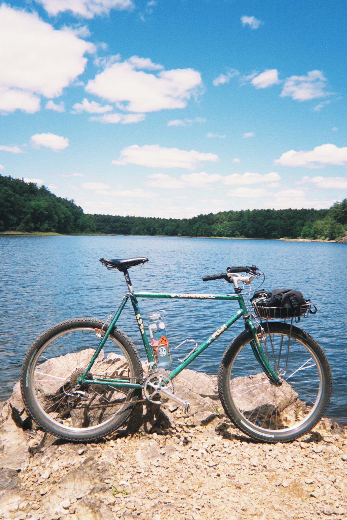 Green vintage Fuji Sundance MTB by a lake